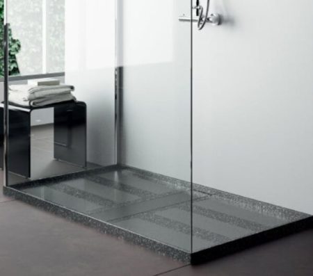 Image of 4 Platos de ducha 600x529 1 in Designer bathrooms with unique materials - Cosentino