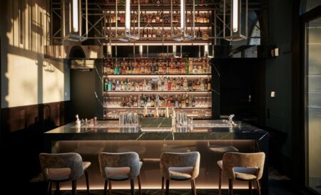 Image of bar am wasser referenz QUER kueng schreinerei emmen 28 in The bold black of Silestone Et Marquina for one of Switzerland’s most awarded (and beautiful) bars - Cosentino