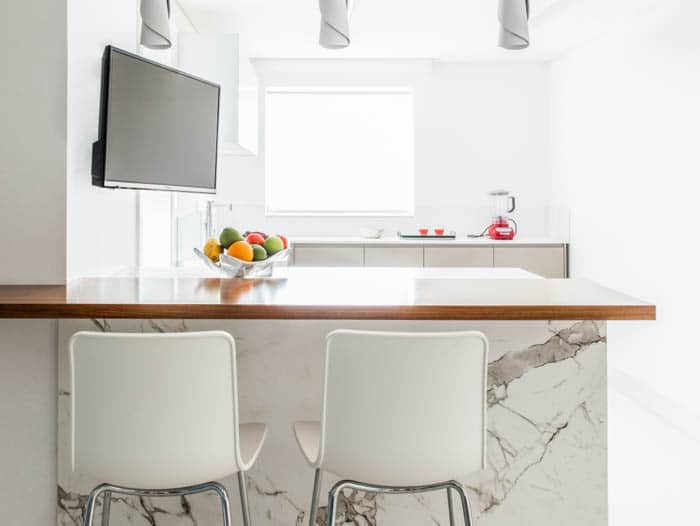 Image of 10 1 in Walls, countertop, and island in the same material - Cosentino